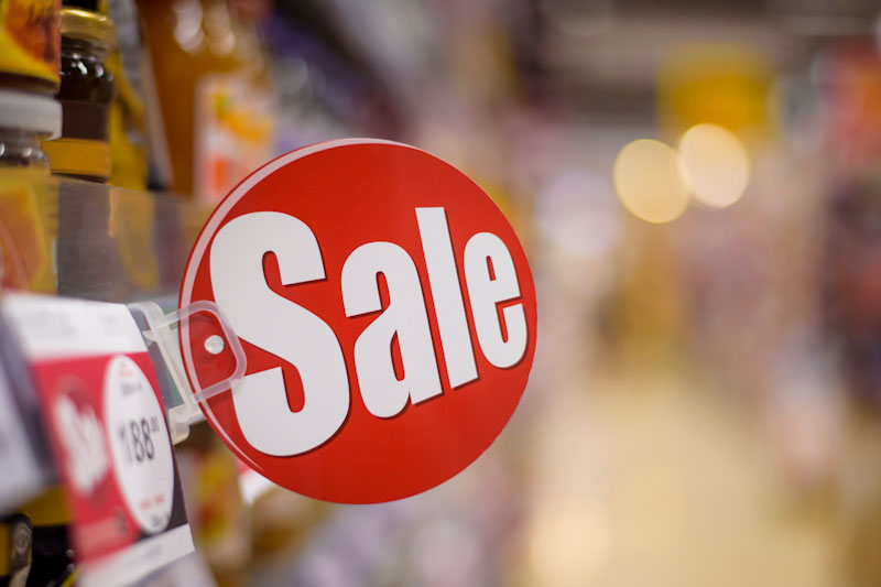 Discount sign in supermarket .